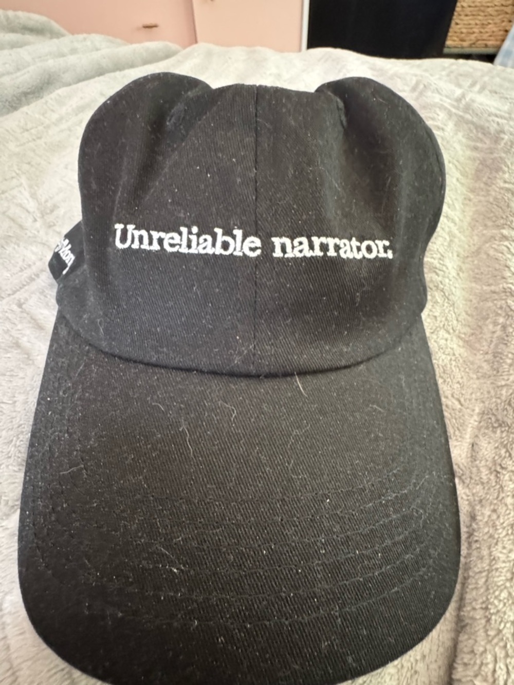 "Unreliable narrator." Embroidered Black Baseball Cap